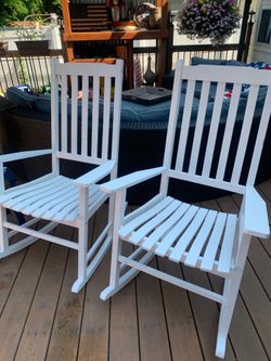 Two wood porch rocking chairs ( or use inside )