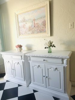 Large white 2 nightstands beside tables