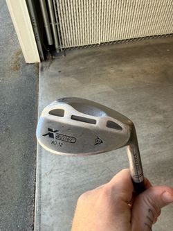 Various golf clubs