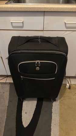 **Swiss Gear** Travel Suitcase W/Fully Rotating Wheels