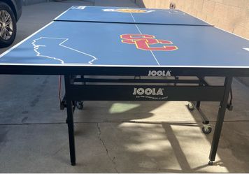 custom-designed table tennis (ping pong) table or beer pong table featuring a split sports theme.