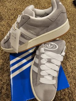 Reduced New Gray Adidas, Size 6.5 $60. Lace up.