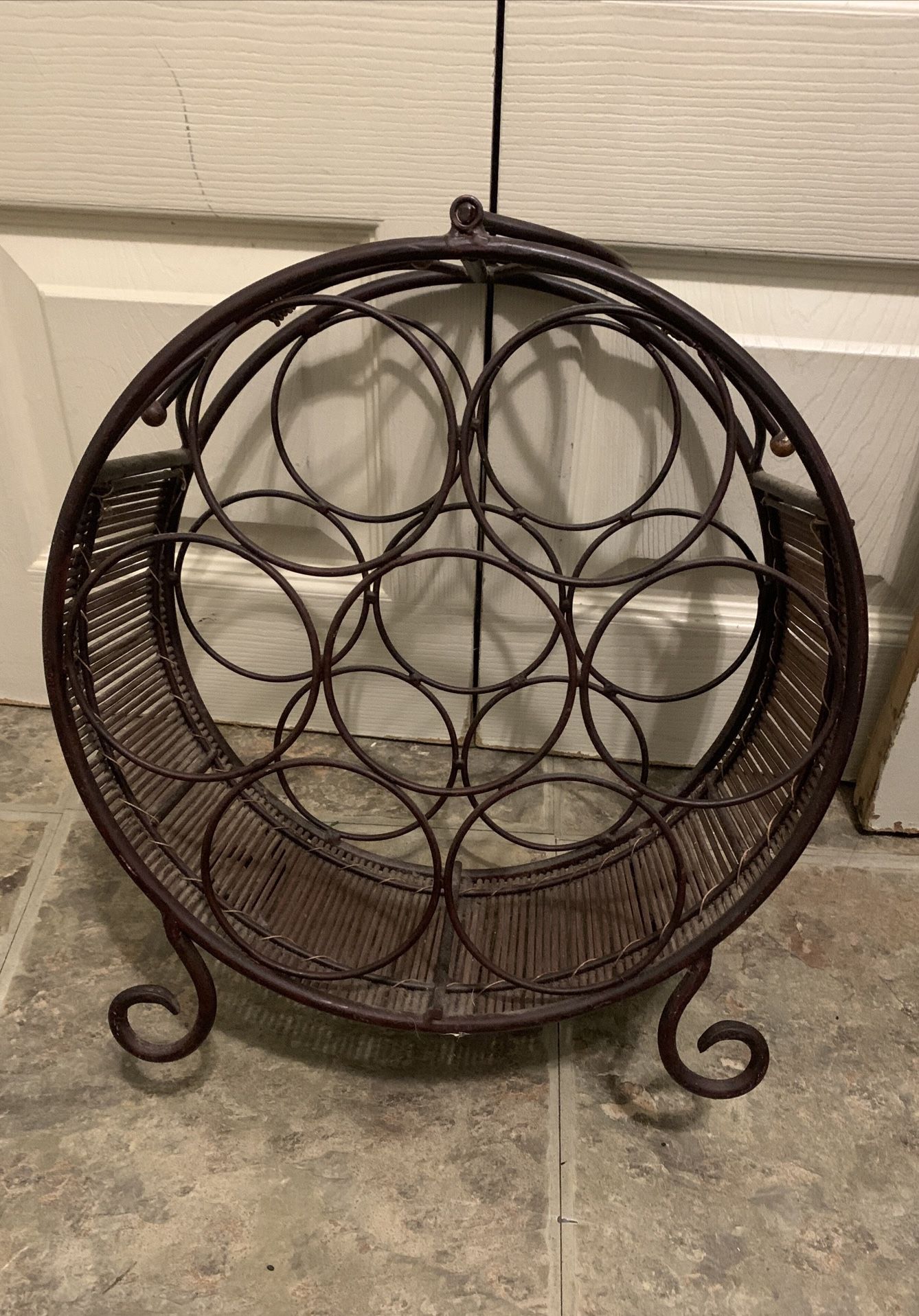 Wicker and metal wine rack bottle holder