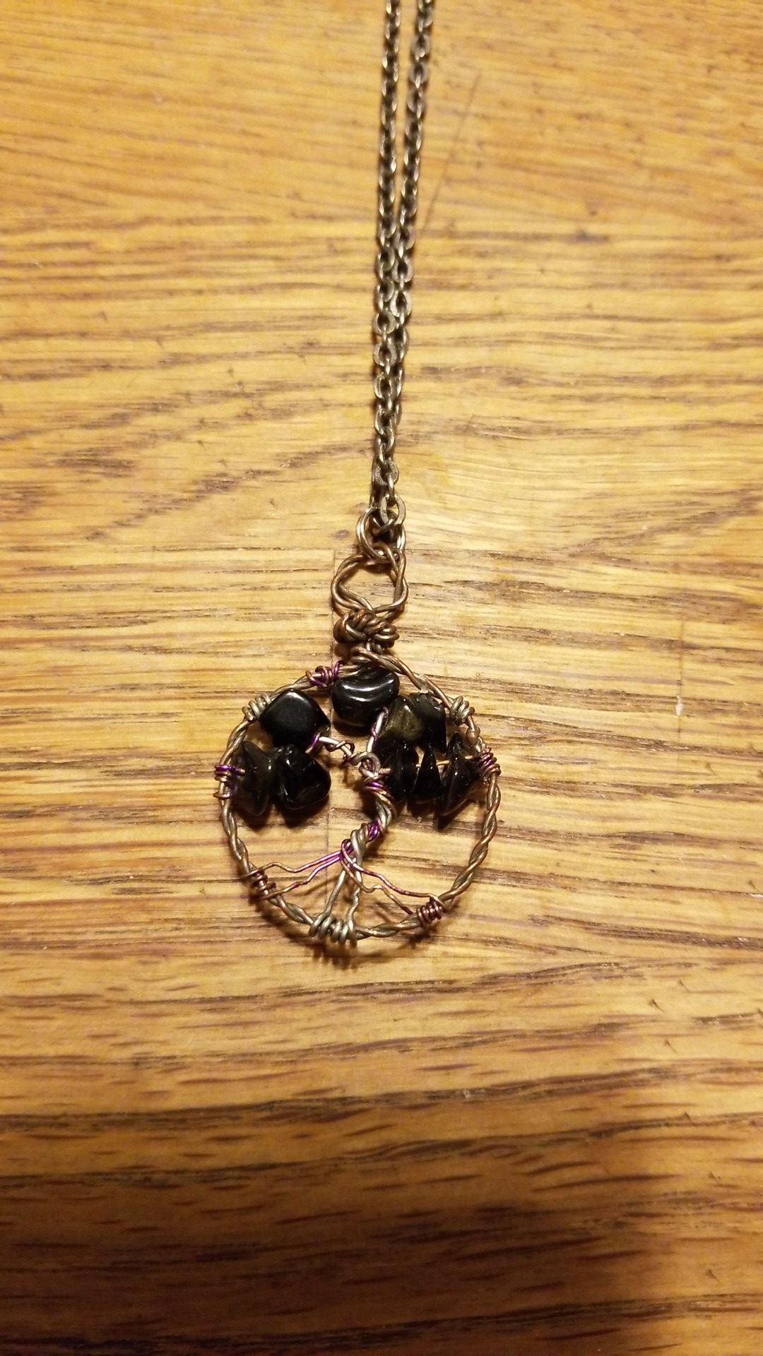Hand wire wrapped peace tree necklace