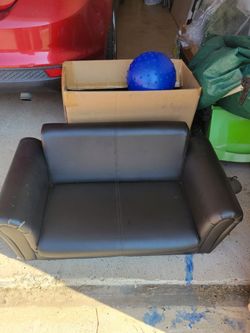Small 2 seater toddler sofa and toys