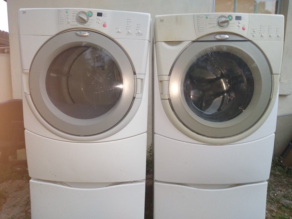 Whirlpool duet HT washer and dryer combo with storage drawers underneath
