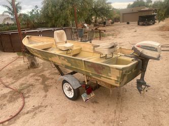 14 aluminum fishing boat Evi ride 5hp motor and trolley