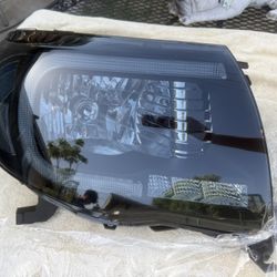05-11 Toyota Tacoma Black Smoke LED Strip Headlights