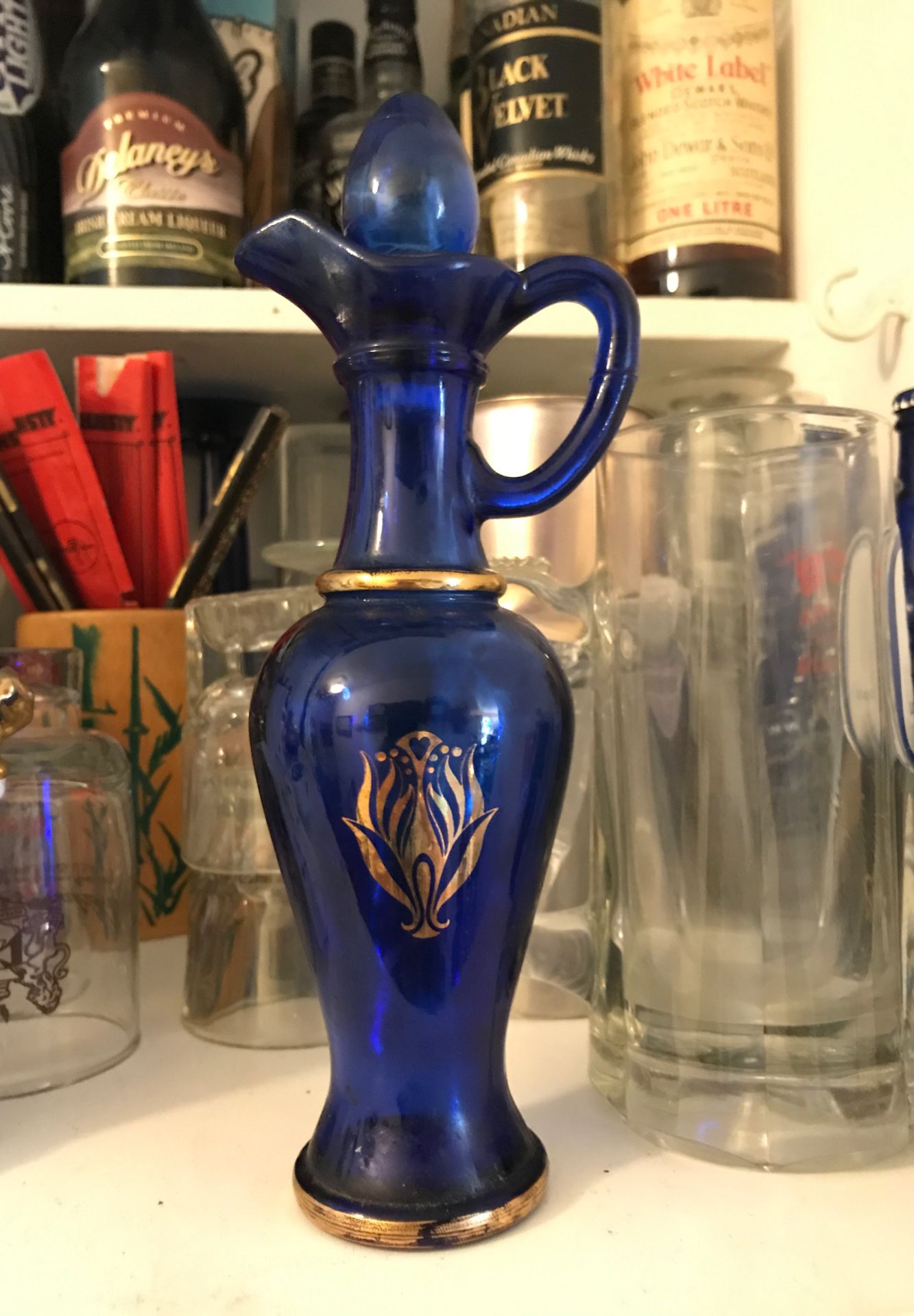 Antique glass Avon Bottle