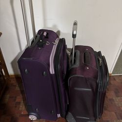 Purple suitcases! Carry on $25