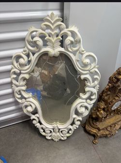 white ornate baroque-style wall mirror beveled glass