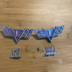 Pair Of Chevy Emblems.