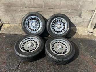 BMW e28 chrome 14 inch wheels and old tires. 5 on 120mm