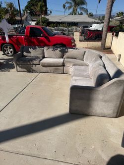feathered 8 person couch COME TODAY AND GET IT FOR $100