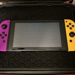 Nintendo Switch with 4 Controllers and all Accessories