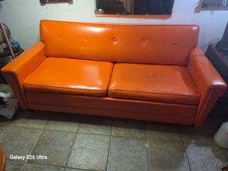 Orange leather sofa 60s