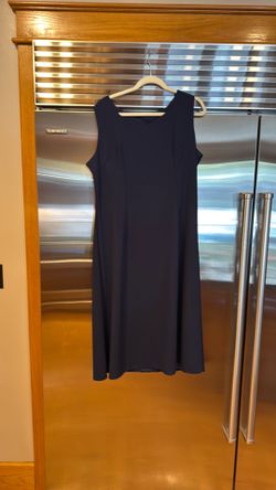 Navy slip dress with embroidered jacket is beautiful blue flowers and geeen leaves