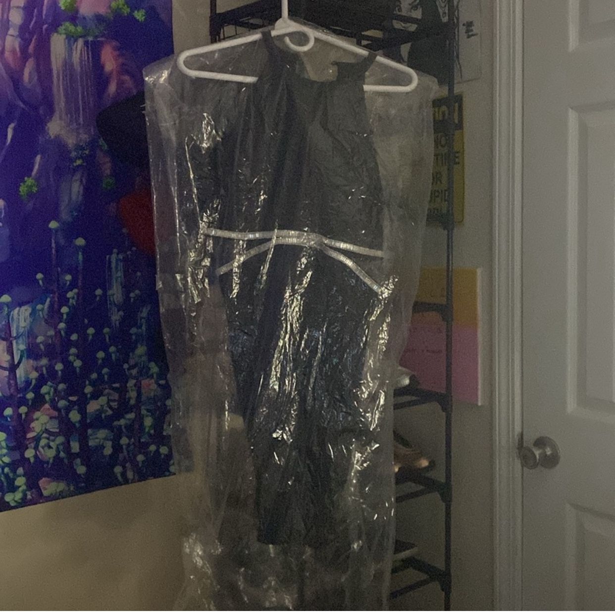 Black Dress With Silver Accents Cut Open On Both Sides