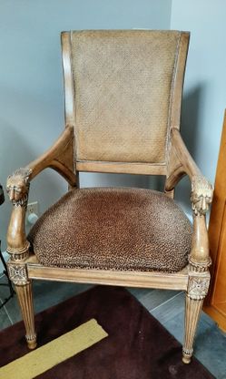 2 upscale double cane chairs. Leopard velvet cushions. Solid wood .