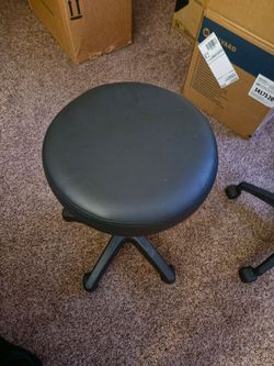 Black rolling swivel stool