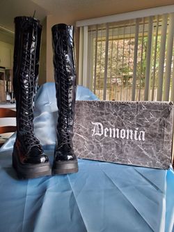 Demonia Shaker-374 platform boots over the knee