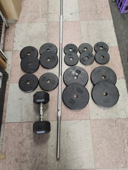 100 lb plates and one dumbbell plus 1 in bar great for a teenager to start working out.