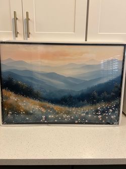 Field of flowers with mountain