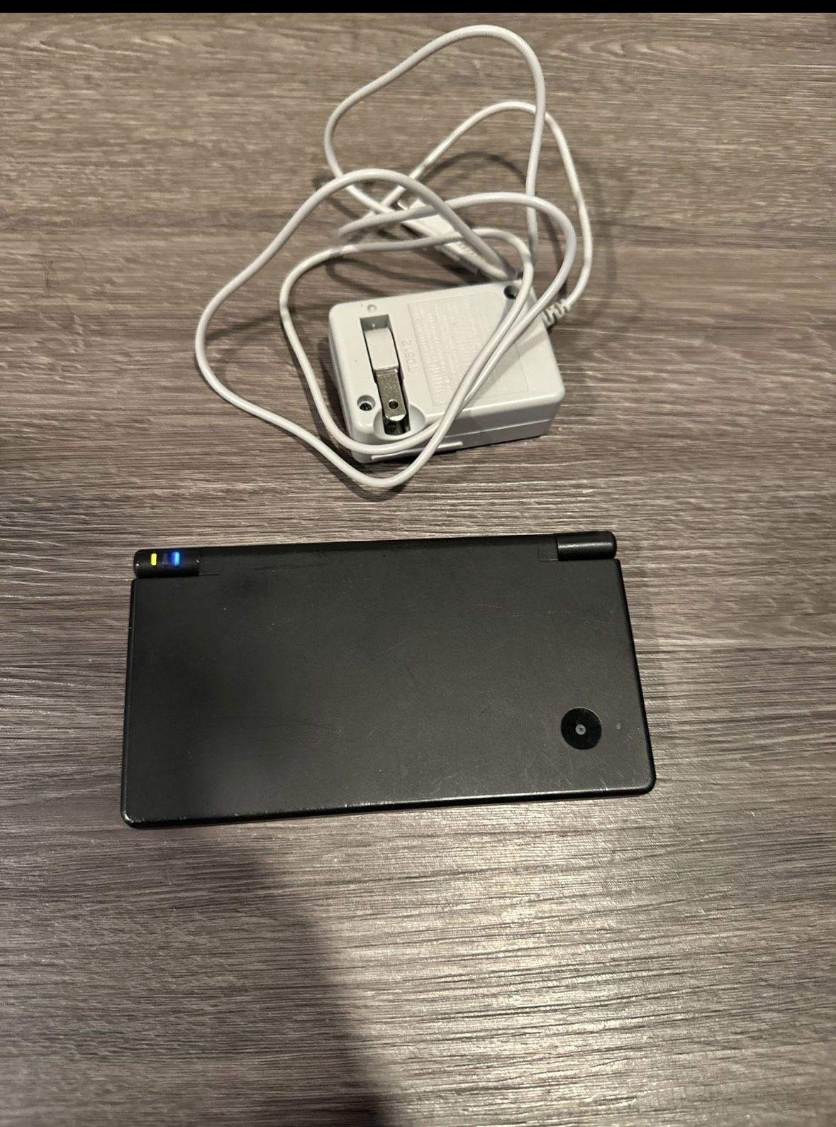 Nintendo ds used all black with charger no stylist