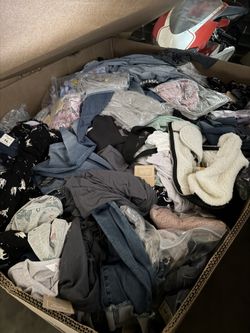 pallets with mixed clothing