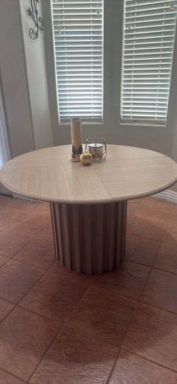 Beige Round Dining Table