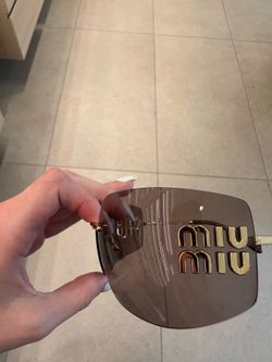 miu Miu wrapped glasses