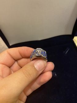 Ring with blue and white diamonds