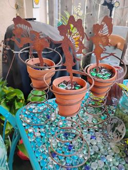 3 metal fairies rustic bed spring
