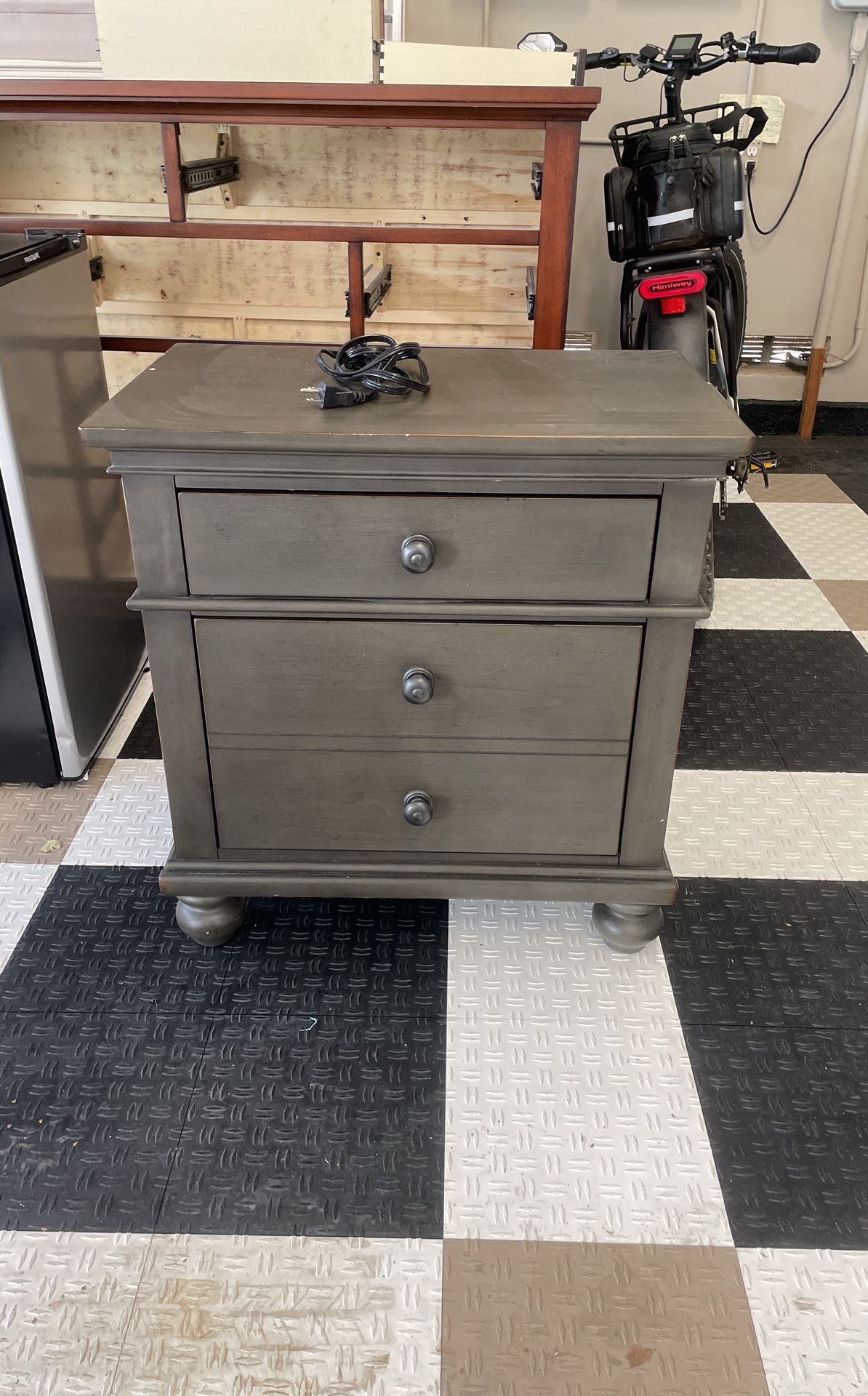 Greenish/grey electric night stand.