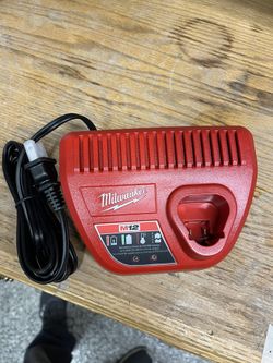 Milwaukee M12 battery charger. New .