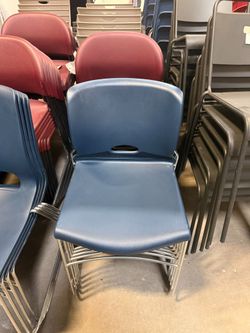 Blue stackable plastic chair