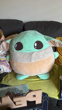 Star Wars Grogu Squishmallow plush toy featuring soft, fuzzy light-brown and beige coat details