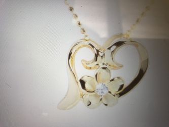 Yellow gold plated sterling silver floating heart with plumeria necklace chain in cluded