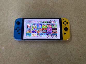 Nintendo Switch OLED with 100 Switch Games and 7000 Retro Classic Games