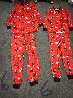 Matching Christmas pajamas in men Xl and woman’s Medium