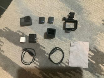 GoPro hero 5 black + extra battery and dual charger.