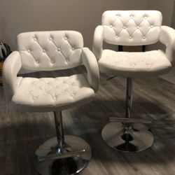 2 White Adjustable Bar Stools . Chrome Based