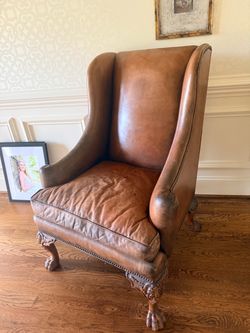 Brown Leather Wingback Chair with Carved Claw Feet