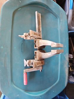 Portable clamp down vice