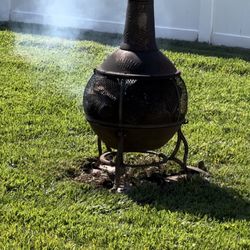 Rustic Fire Pit With Stack 