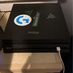 Ps4 Pro 1TB with 2 controllers, 3 games.