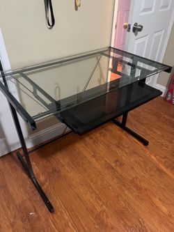 Desk with slide out keyboard tray