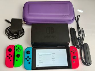 Nintendo Switch + Extra Joy-Cons + Travel Case