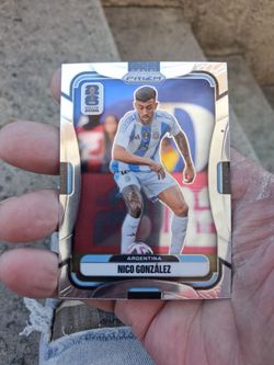 2026 Panini Prizm FIFA World Cup #16 Nico González base trading card featuring him playing for the Argentina national team. Near Mint/Mint Condition.