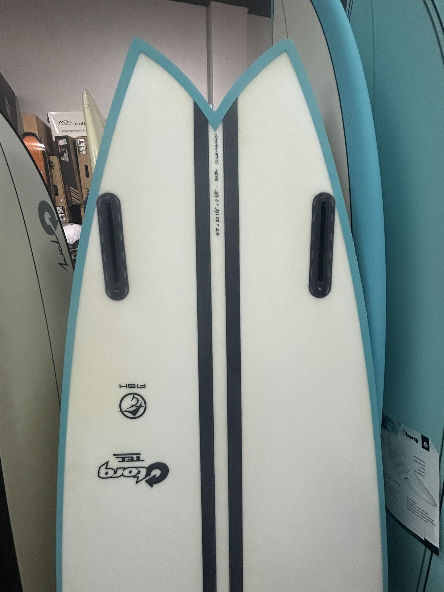Epoxy Torq, Twin Fin 6-0 Surfboard At Catch A Wave Surf Shop